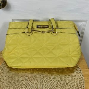 Catherine Malandrino yellow quilted purse with gold hardware. Zipper closure